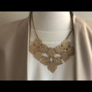 Filigree leaf bib statement necklace, gold